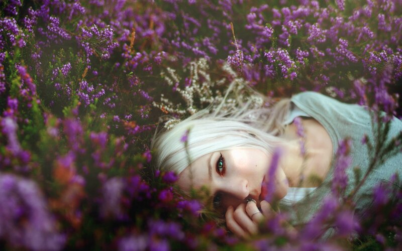 woman in purple flowers