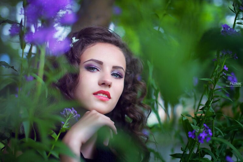 woman in purple flowers