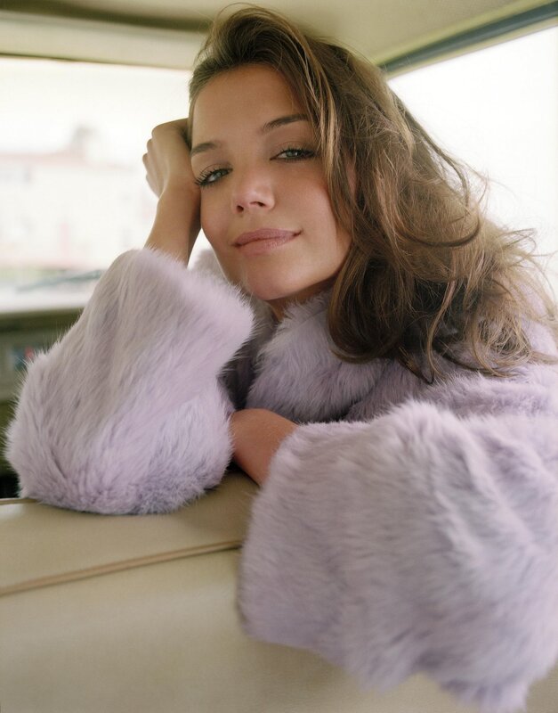 woman in purple fur coat