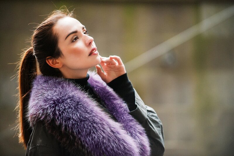 Woman in Purple Fur Coat — Contemplative