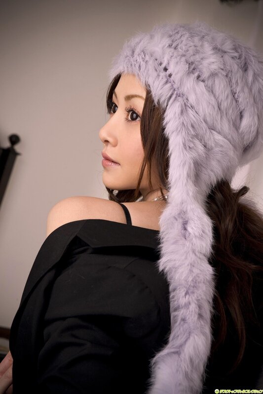 woman in purple fur hat