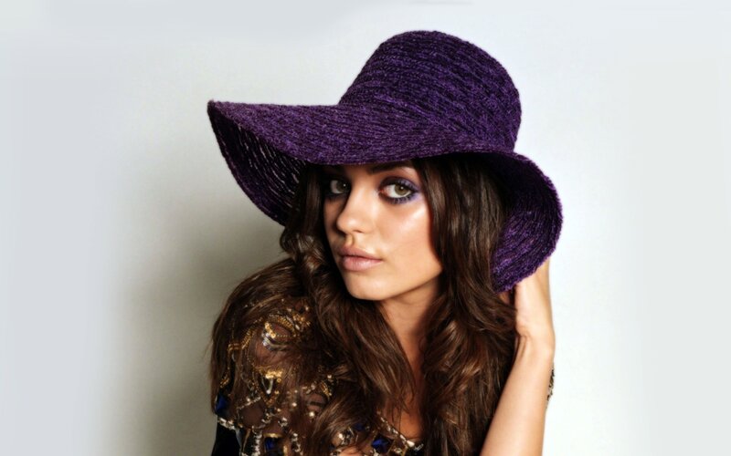 woman in purple hat