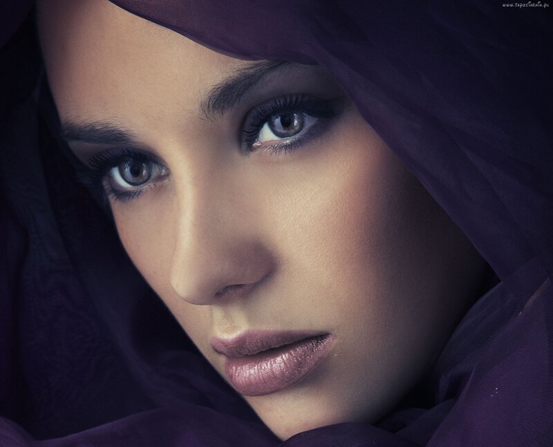 woman in purple headscarf