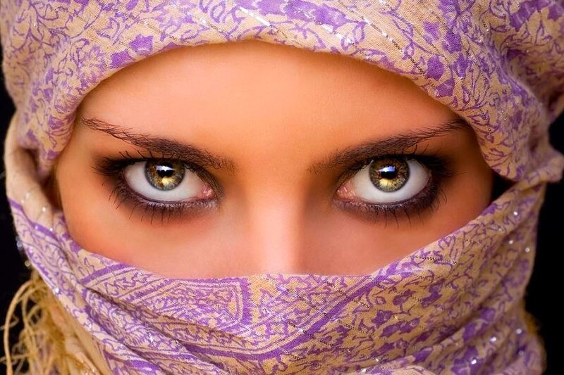 woman in purple headscarf