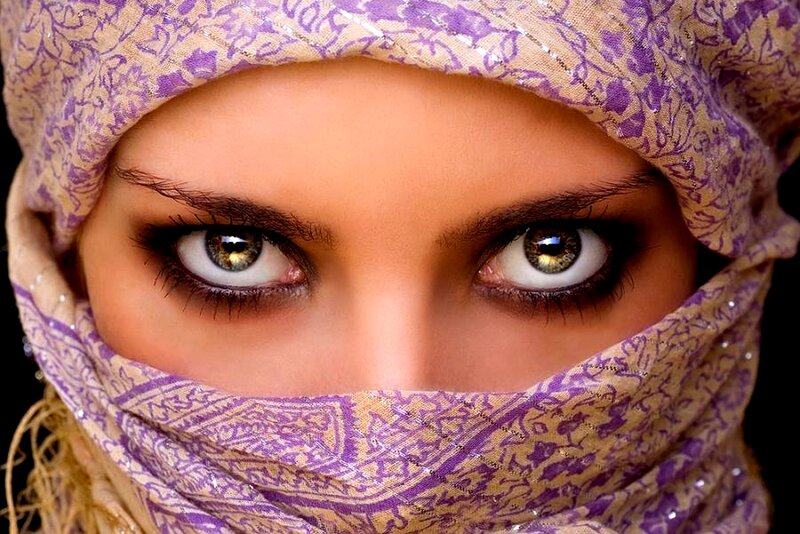 woman in purple headscarf