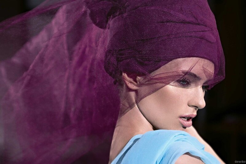 woman in purple headscarf