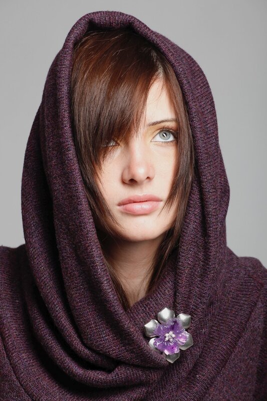woman in purple hooded scarf