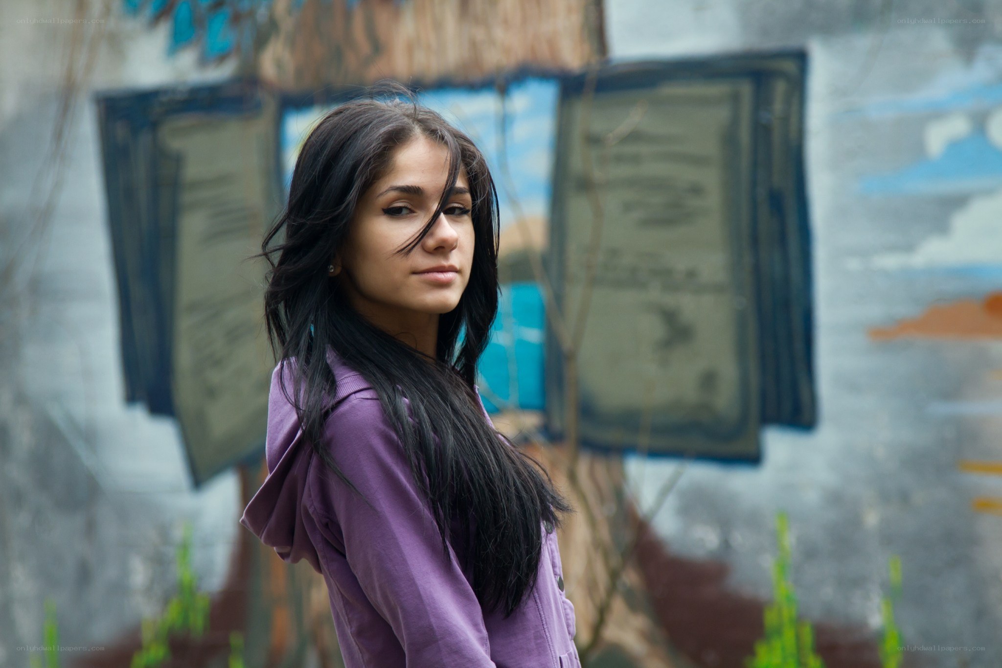 woman in purple jacket