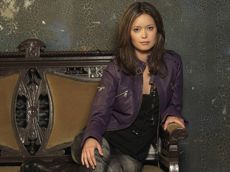 woman in purple jacket