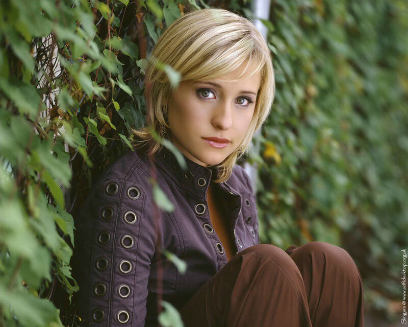 woman in purple jacket