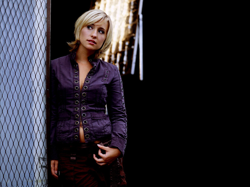 Woman in Purple Jacket — Dramatic, Photograph, Chain-link Fence