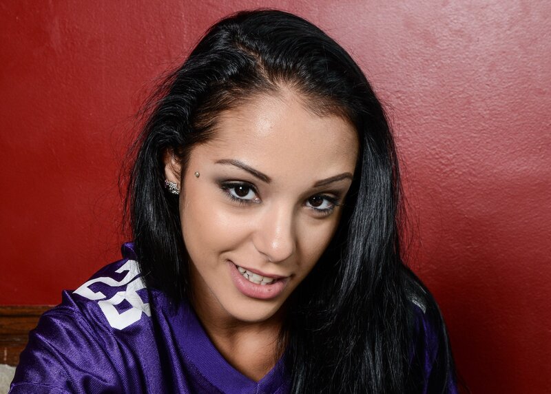 woman in purple jersey