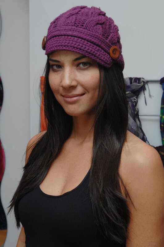 Woman in purple knit hat