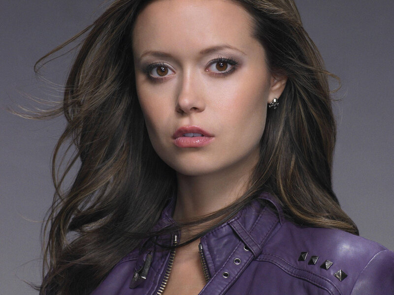 woman in purple leather jacket