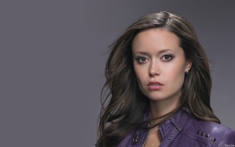 woman in purple leather jacket