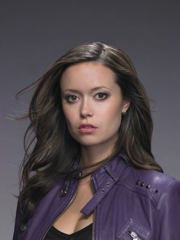 woman in purple leather jacket