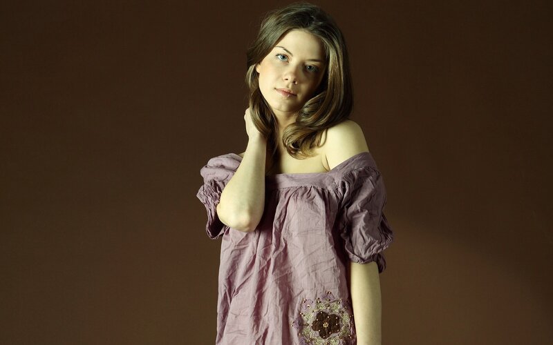 woman in purple off-shoulder dress