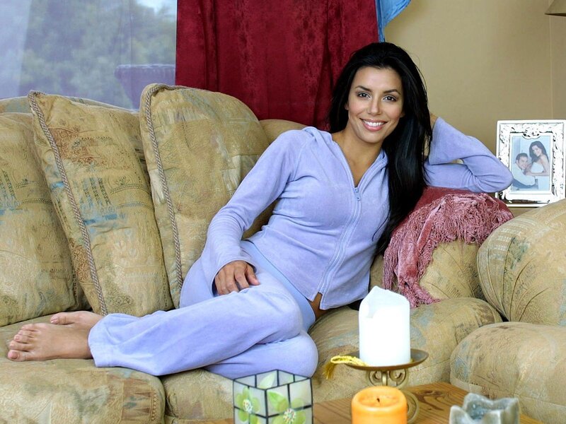 woman in purple pajamas on couch