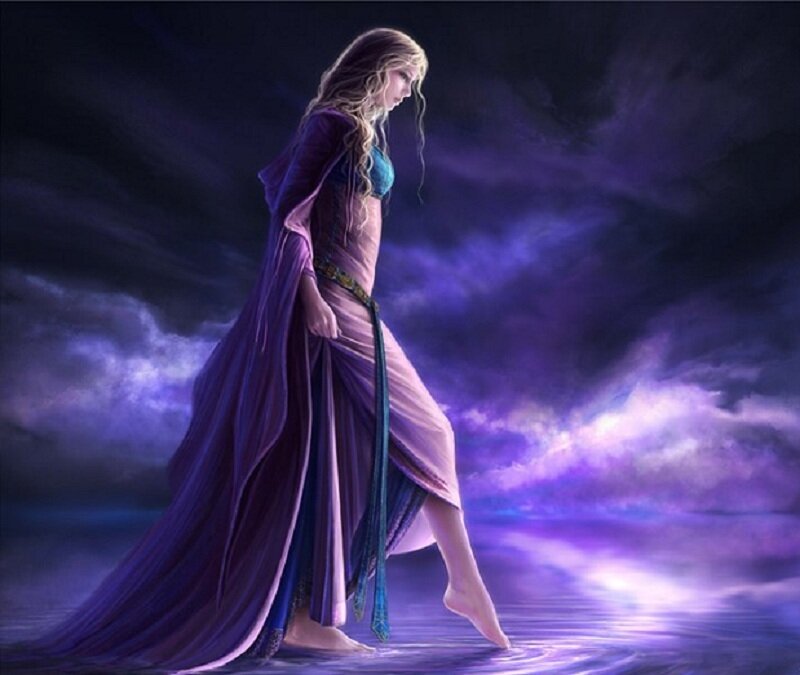 woman in purple robe by water