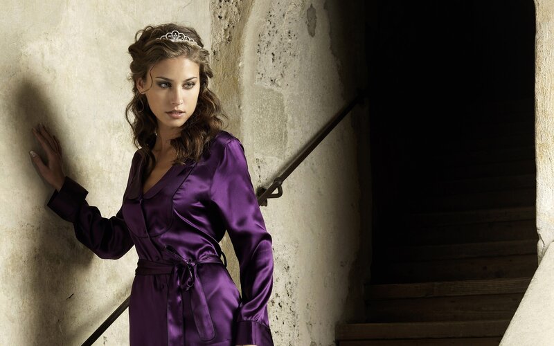 woman in purple robe with tiara