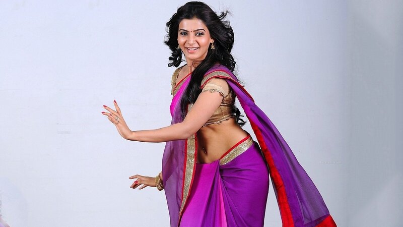 woman in purple saree dancing