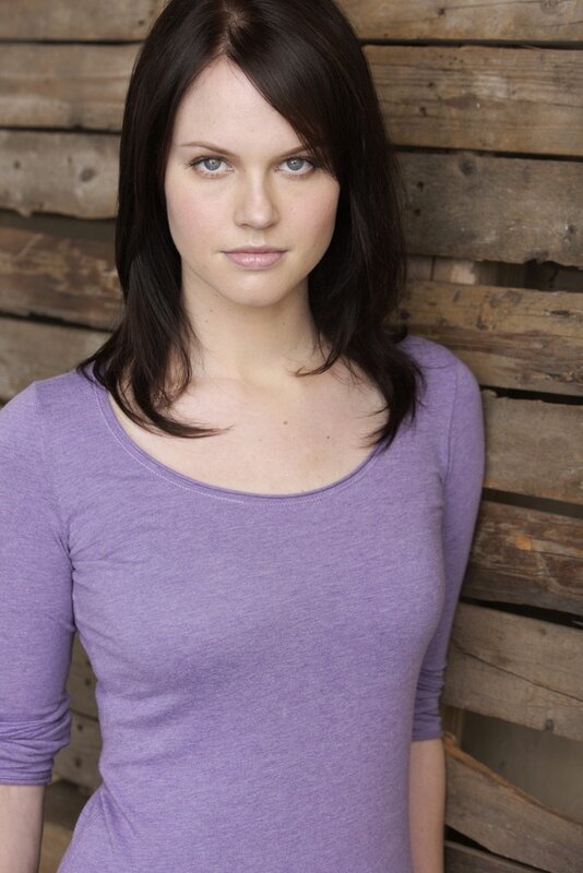 woman in purple shirt