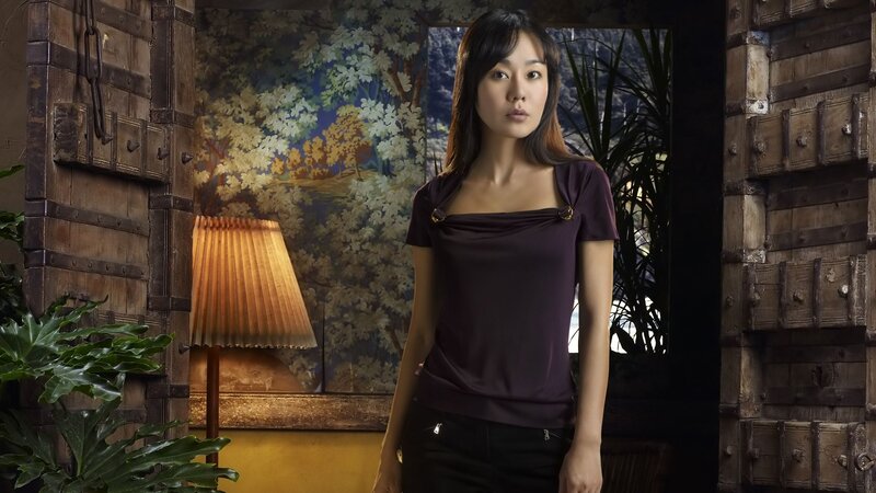 Woman in Purple Shirt — Dramatic, Photograph, Lamp