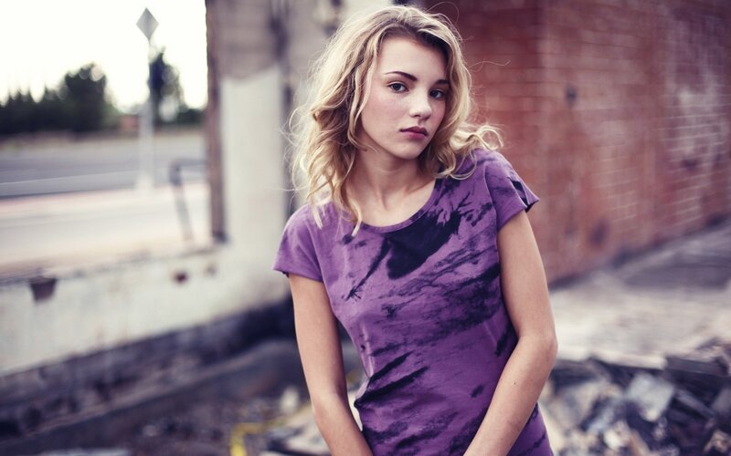 Woman in Purple Shirt — Serious, Afternoon