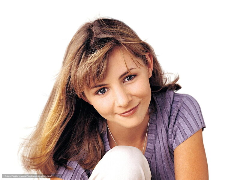 woman in purple shirt smiling