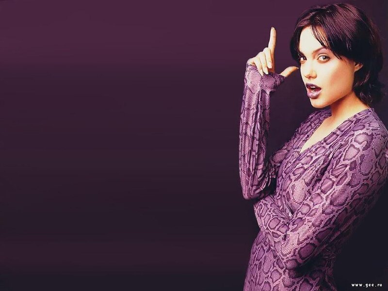 woman in purple snakeskin dress