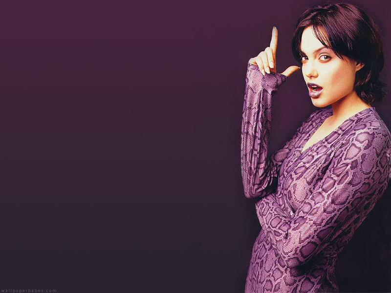 woman in purple snakeskin dress