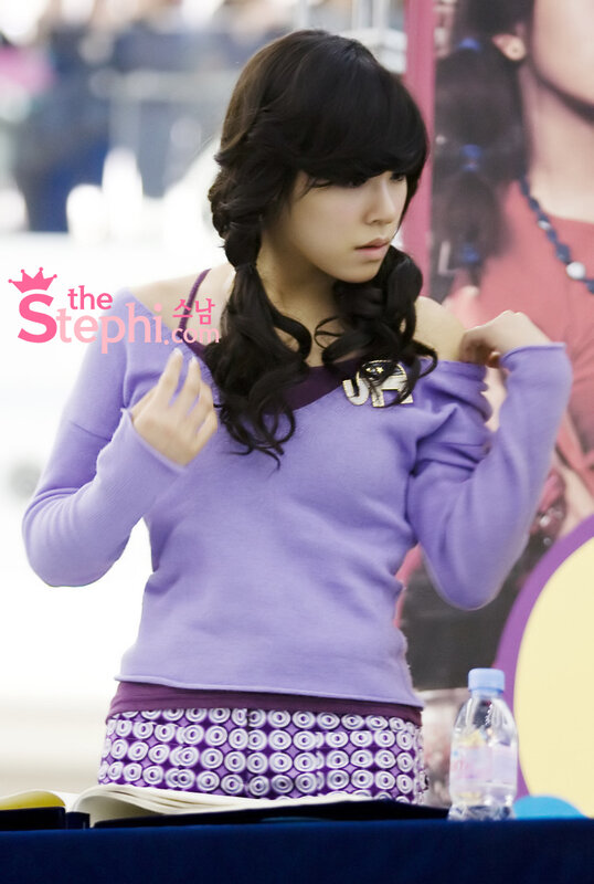 woman in purple sweater