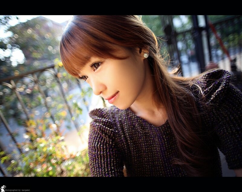 woman in purple sweater