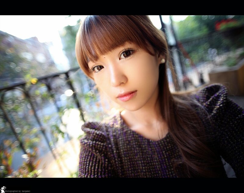 woman in purple sweater