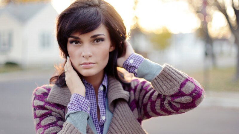 woman in purple sweater