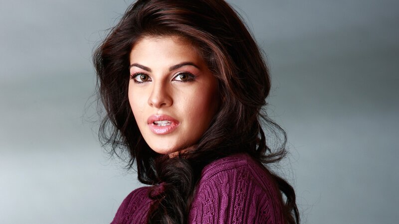 woman in purple sweater