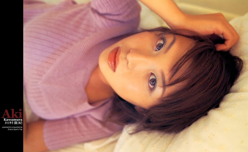 woman in purple sweater lying down