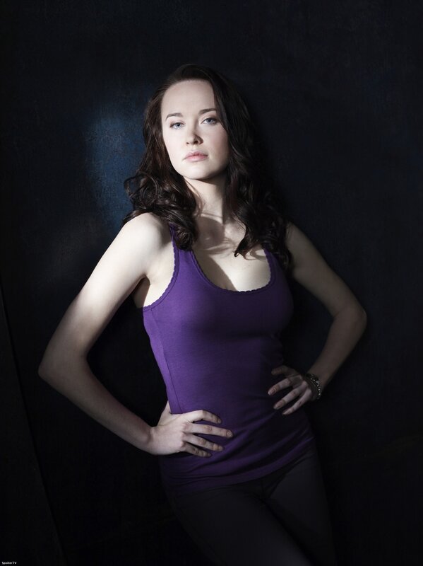 woman in purple tank top