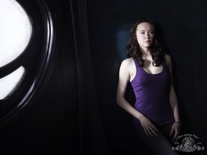 woman in purple tank top
