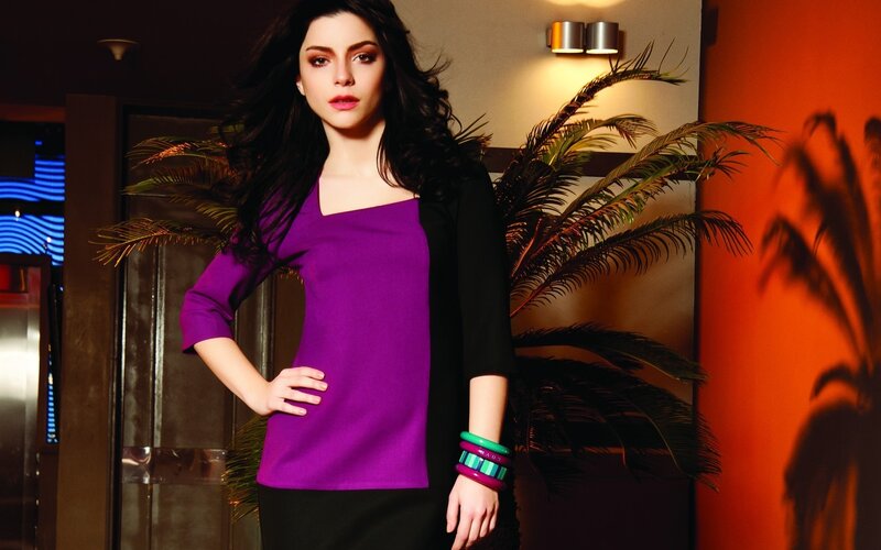 woman in purple top