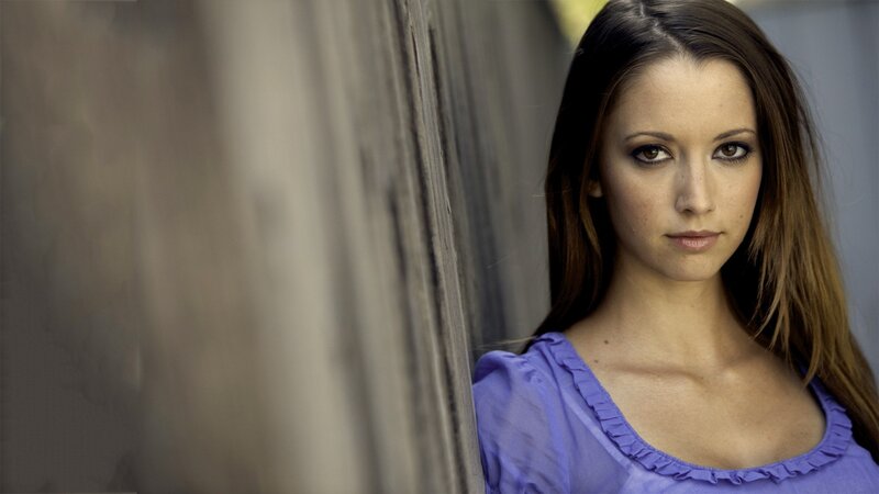 woman in purple top