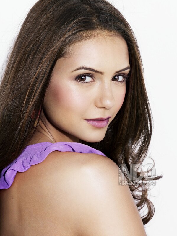 woman in purple top