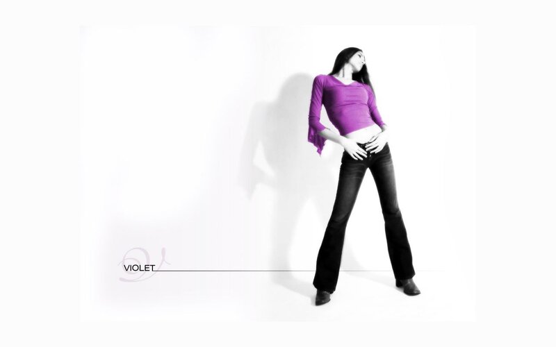 woman in purple top posing
