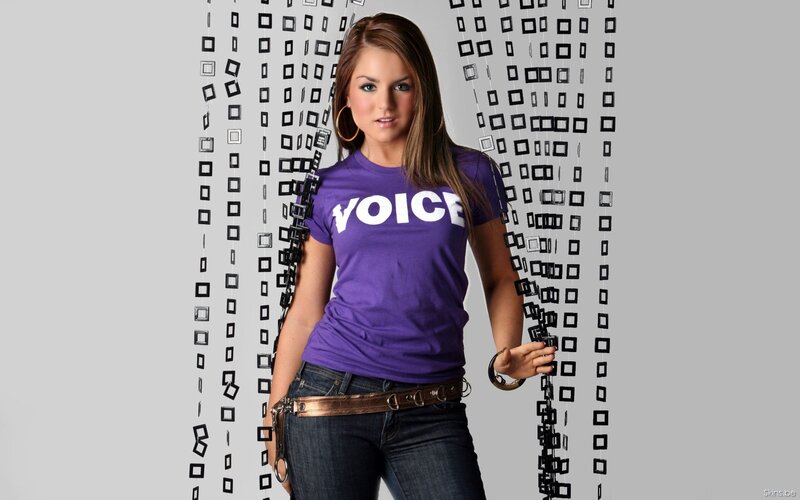 Woman in purple VOICE t-shirt