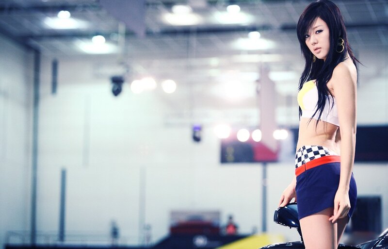 woman in racing outfit