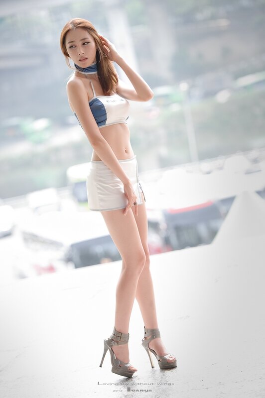 woman in racing outfit
