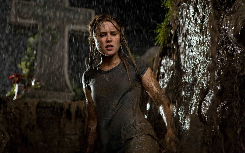 woman in rain and mud