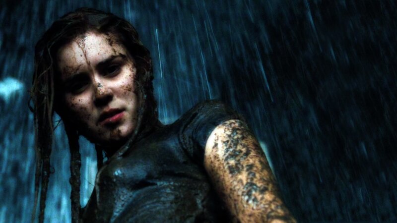 woman in rain and mud