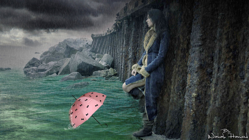 Woman in Rain by Sea