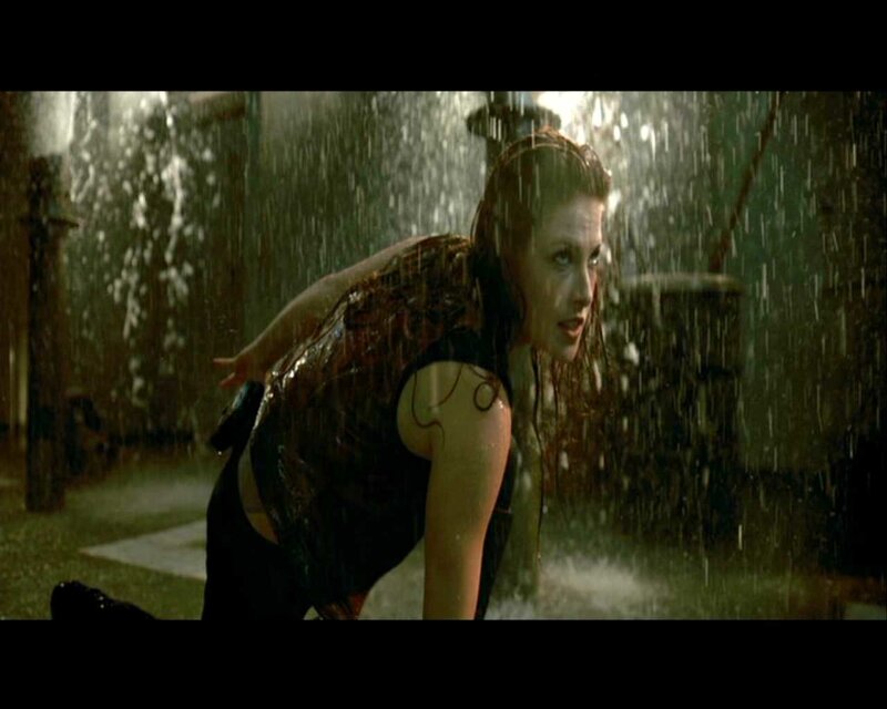 Woman in Rain — Green, Dramatic